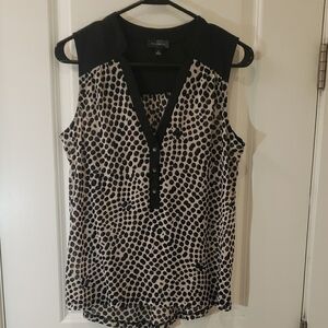 The Limited Black and White Sleeveless Buttoned Polo Blouse